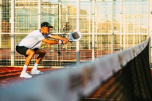 Man playing padel outdoors