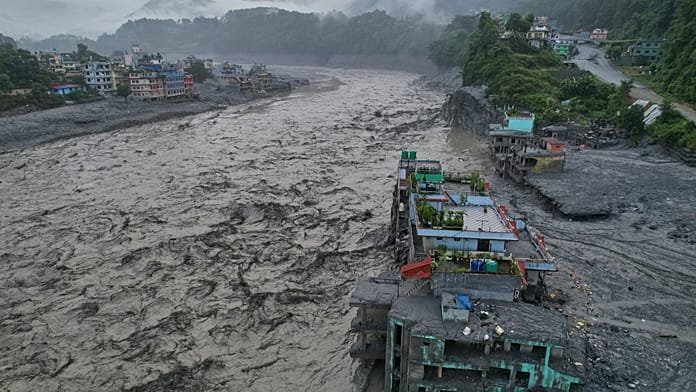 Authorities in Nepal carry out temporary burials of unidentified flood victims causing public outrage