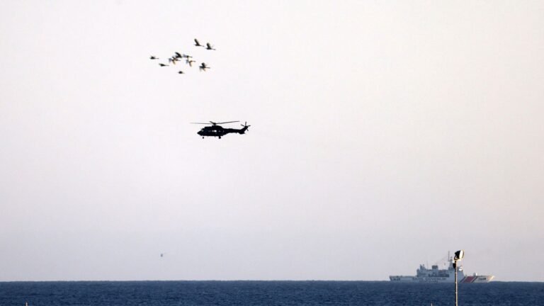 Capsized ferry disaster kills at least eight, as search for survivors continues