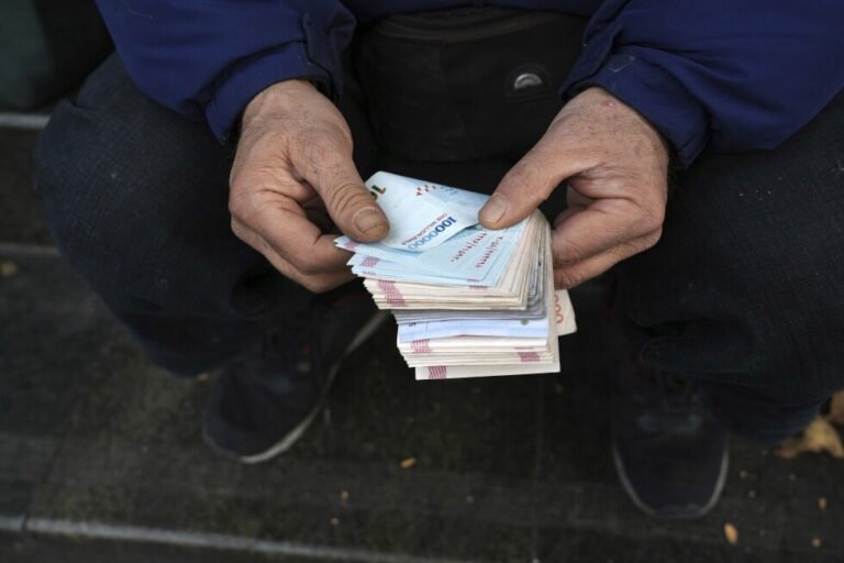 Iran's rial currency hits new record low as US prepares to announce more sanctions