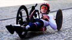 The handcyclist and model grabbing every opportunity after paralysis