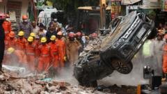 Dozens feared trapped in collapsed building in Delhi