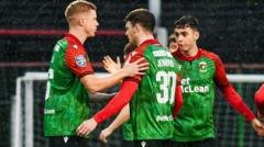 Glens beat Blues to progress as holders Carrick bow out