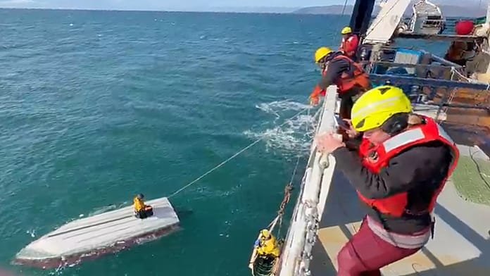 Moment teen is rescued after three days adrift in frigid waters