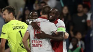 Monaco rally to edge winless PSG and reclaim top spot