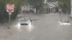 Flash flooding interrupts half-marathon, submerges cars