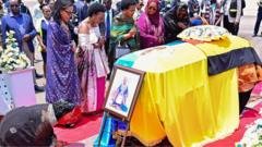 Body of world's youngest traditional king returns home to Uganda amid succession row