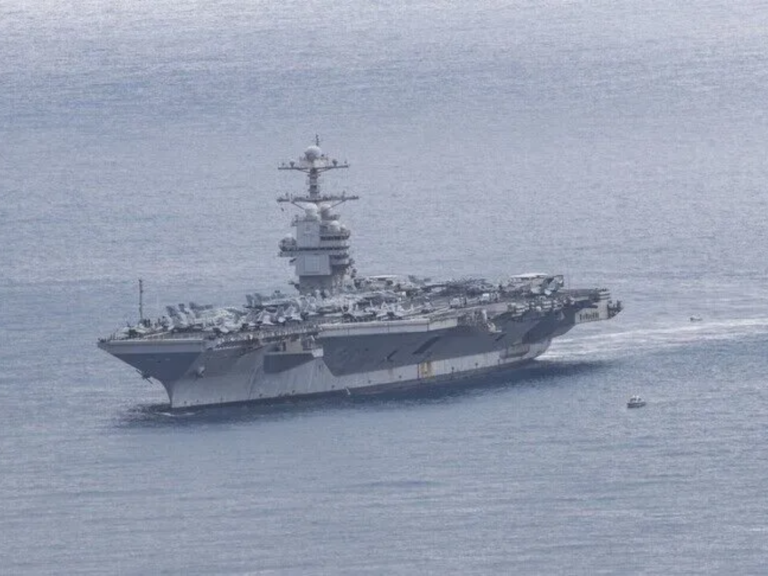 Iran’s Revolutionary Guards say missiles struck US aircraft carrier, destroyer