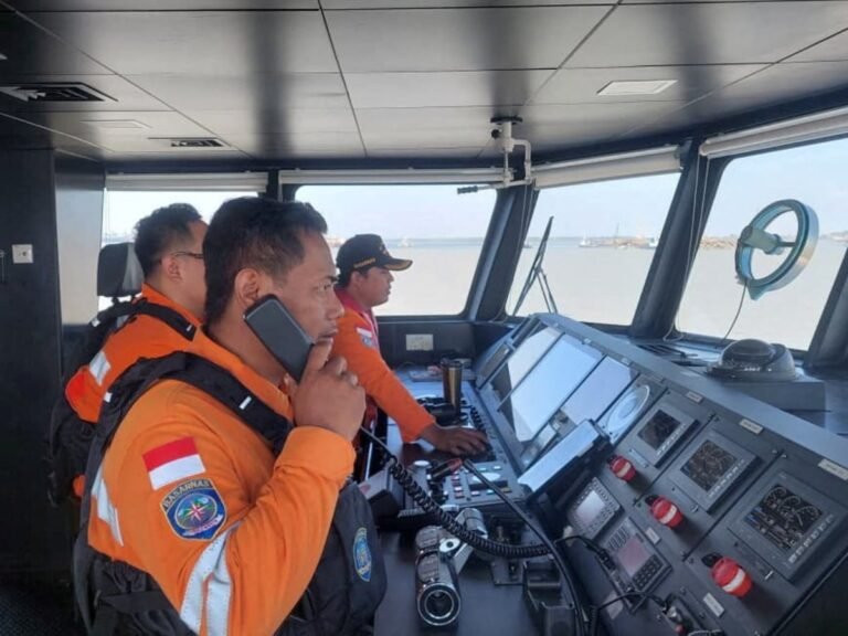 Indonesia rescuers battle turbulent seas in search for 129 people after passenger ship capsizes