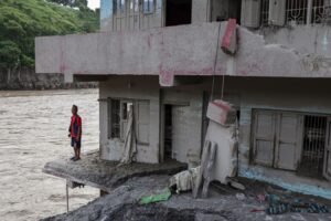 Death toll climbs to 1,442 from devastating floods, mudslides at Nepal-China border, with 5,700 missing