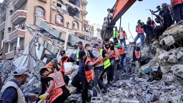 At least 21 killed and dozens trapped after war-damaged Gaza building collapses